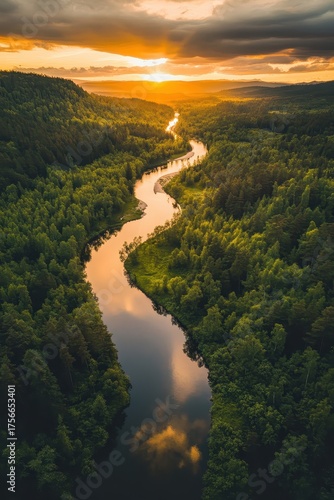 A river surrounded by trees at sunset