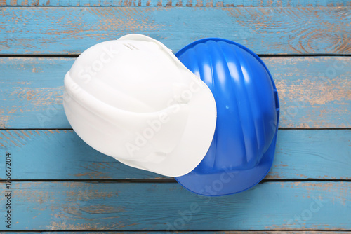 Modern hardhats on wooden b...