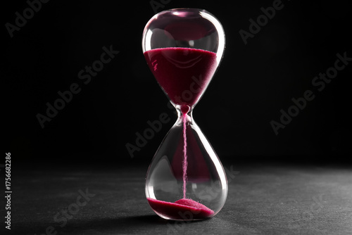 Hourglass with pink crystal...