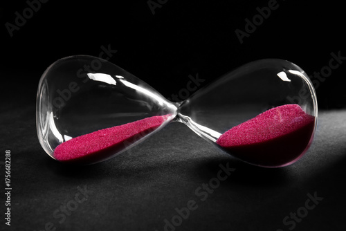 Hourglass with pink crystal...