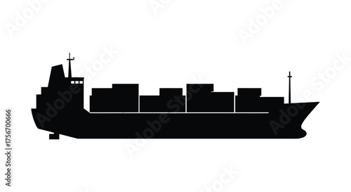 Black silhouette of a large cargo ship carrying many containers across the sea during the day