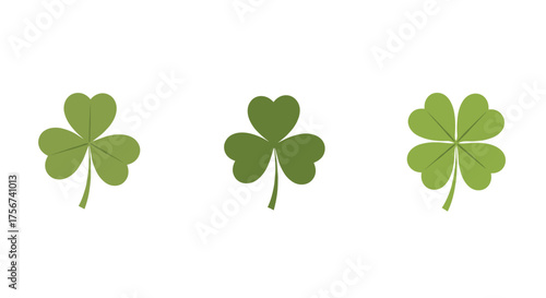 Three green shamrocks and one four leaf clover on a white background.