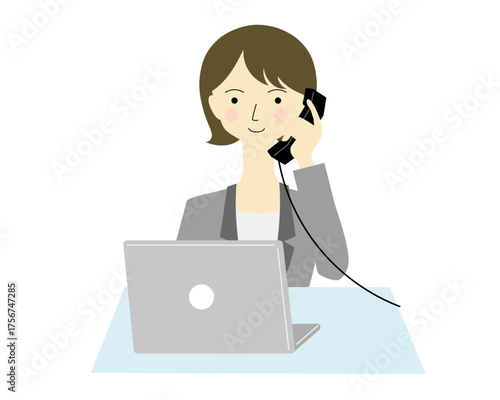 電話対応しながらパソコン操作する女性　ボブ外はね
A woman operating a computer while answering the phone   
