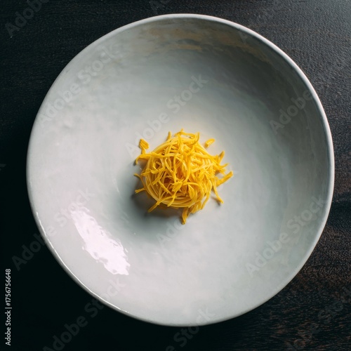 Delicate Shredded Yellow Ingredients in Minimalist White Bowl