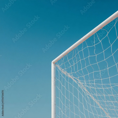 Close-up of a Soccer Goal Net Against a Clear Blue Sky