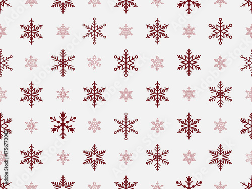 Seamless repeating pattern of snowflakes outlines of varying sizes and designs in dark maroon, on a light grey background