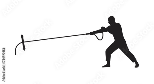 Silhouetted figure actively pulling a long implement with a hook and barred end demonstrating effort and strength isolated on white background