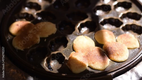 Thai Egg Cake Called Khanom Khai, Khanom Khai in hot pan make by Thai trader, Khanom Khai is a Thai oval sweetmeat made with egg and sugar