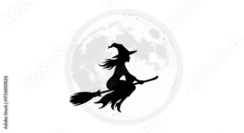 Silhouette of a witch flying on a broomstick against a full moon.