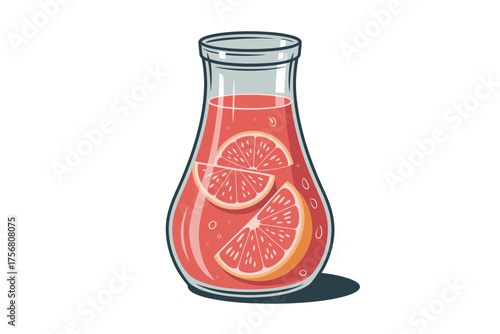Refreshing pink grapefruit infused water in a tall glass bottle