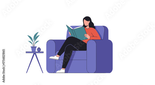 Woman reading book while sitting on purple armchair at home  