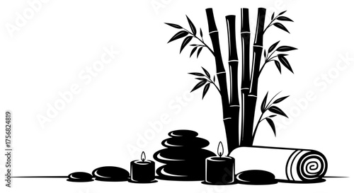 Serene spa scene with bamboo, stacked stones, candles, and rolled towel