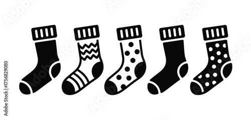 Five patterned christmas stockings in a row black and white illustration