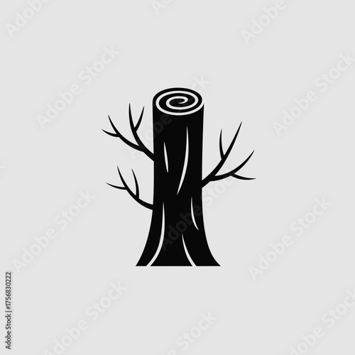 Black silhouette of a tree stump with small branches against a light gray background