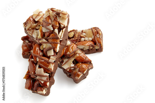 Three caramel nut bars isolated on white background