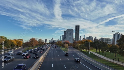 Chicago, Illinois, USA - July 24, 2025: City road full of car. Travel destination. Urban road way highway. Car traffic on the road highway. City skyline highway. Urban traffic. Road way with car