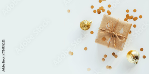 Christmas gift box and decorations on white background
