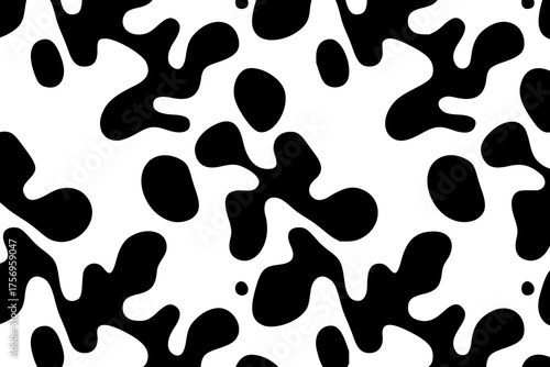 Abstract black and white pattern featuring irregular, amoeba-like shapes scattered across a white background