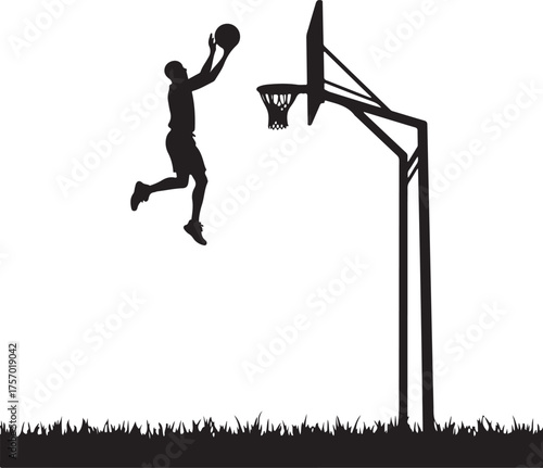 Black silhouette of basketball player dunking on hoop