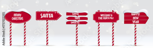 Christmas arrow sign posts set isolated on white background. Vector realistic illustration of red direction indicators with snow and garland lights, road to Santa, North Pole candy cane pointers