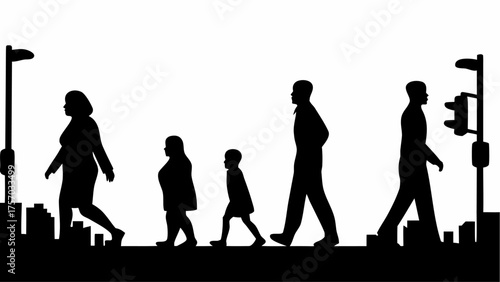 Silhouette of a family crossing the street at a crosswalk with a traffic light and street lamps nearby
