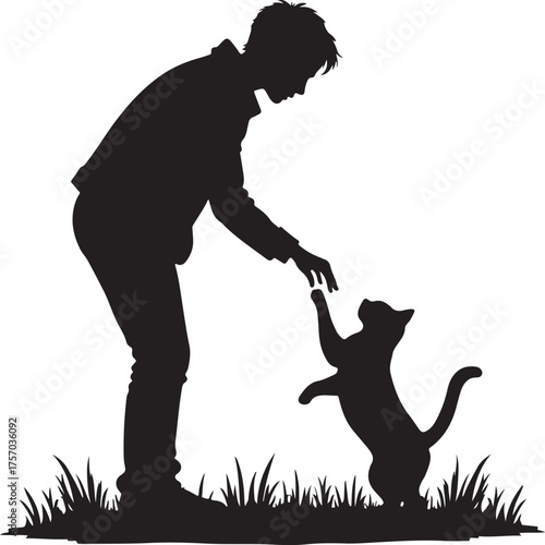 Silhouette of person reaching towards cat standing on hind legs