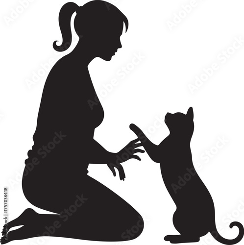 Woman kneeling playing with cat silhouette interaction