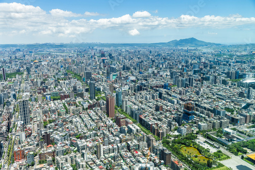 Bird-eye view of Taipei urban architecture landscape from the Taipei 101 Observation Deck, Taiwan. Such as the Taipei Dome, Sun Yat-sen Memorial Hall, and skyscrapers etc.