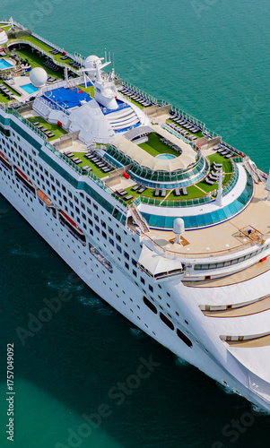 Cruise ships sailing the sea take tourists on a journey and relax on holidays.