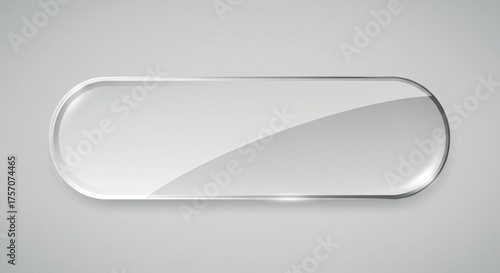 Glossy transparent oval button with reflective surface on plain gray background