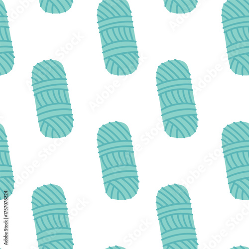 Decorative seamless pattern with blue yarn balls. Textile background for knitting crafts, handmade projects and cozy creative design.