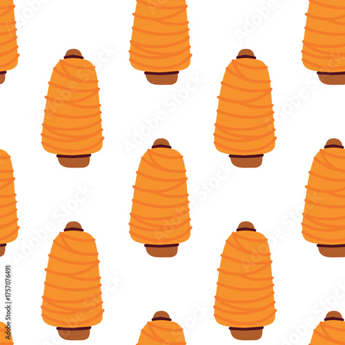 Orange skeins of yarn repeating in seamless pattern for textile and fabric backgrounds in knitting and handmade themes.