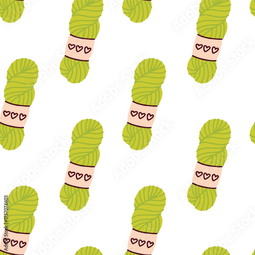 Green skeins of yarn repeating in seamless design for textile, knitting backgrounds and craft decoration.