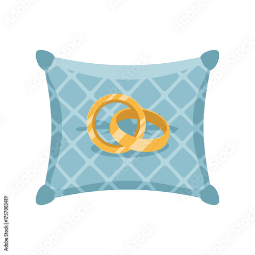 Elegant Wedding Rings on a Blue Pillow, Symbolizing Love and Commitment.