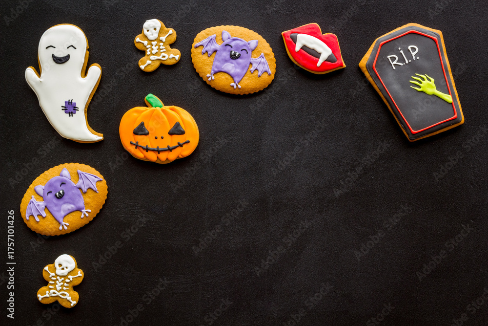 Obraz premium Sweets for Halloween party. Funny gingerbread biscuits top view