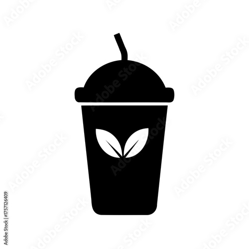 Black silhouette of a healthy green smoothie drink with straw and leaves