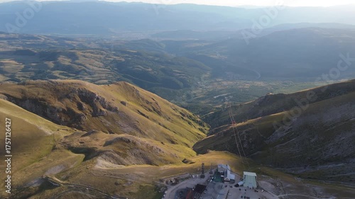 Aerial drone footage of the Astronomical Observatory of Abruzzo at Campo Imperatore, set against majestic mountain landscapes