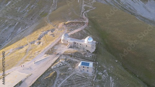 Aerial drone footage of the Astronomical Observatory of Abruzzo at Campo Imperatore, set against majestic mountain landscapes