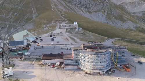 Aerial drone footage of the Astronomical Observatory of Abruzzo at Campo Imperatore, set against majestic mountain landscapes