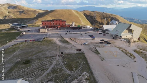Aerial drone footage of the Astronomical Observatory of Abruzzo at Campo Imperatore, set against majestic mountain landscapes