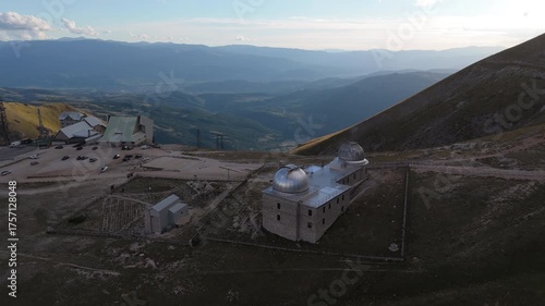 Aerial drone footage of the Astronomical Observatory of Abruzzo at Campo Imperatore, set against majestic mountain landscapes