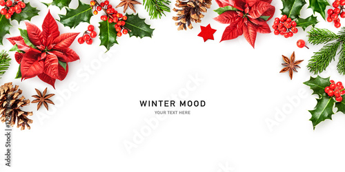 Christmas frame border with red poinsettia and holly. Flat lay photography isolated on white background