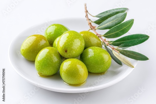 Castelvetrano Olives. Fresh Green Olives on White Plate, Isolated with Olive Oil Drizzle