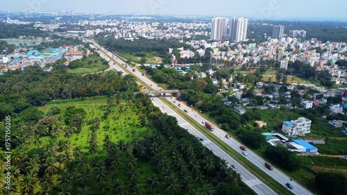 Ariel Shot of beautiful Bangalore City in India with nice road highway connecting Mysore passingby in Karnataka, India