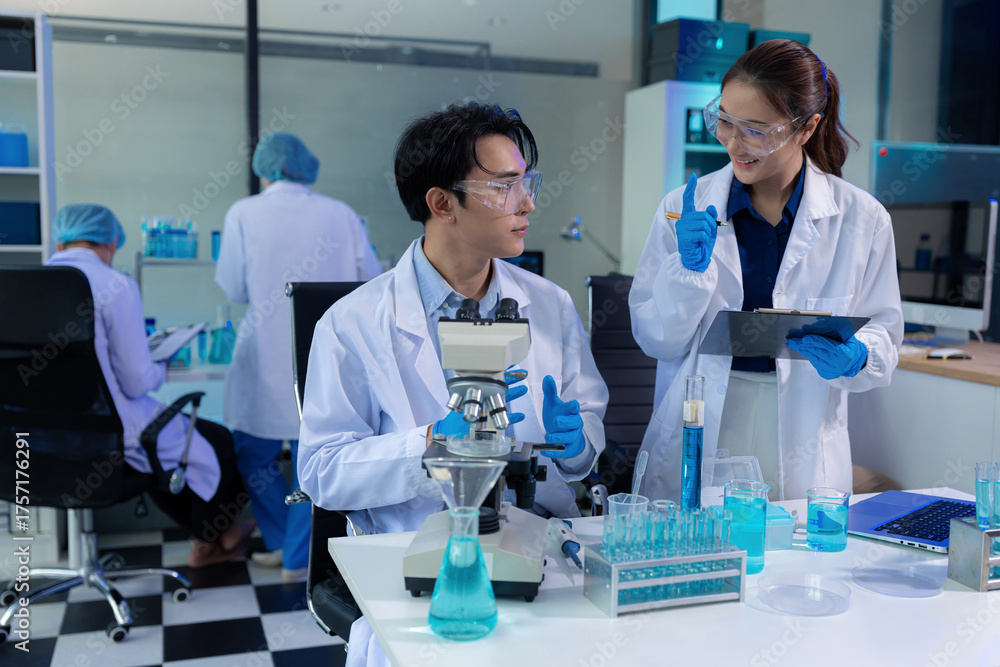 Fototapeta premium scientist researcher conducting an experiment working in the chemical laboratory.