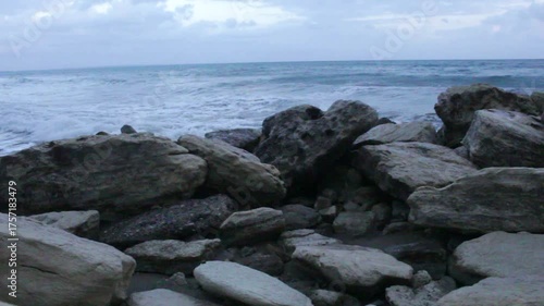 Rocky Cliff by the Sea with Waves Crashing at Cyprus Beach