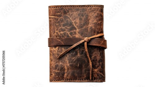 A brown leather journal with a tie on a black background