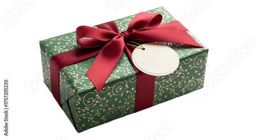 Wrapped gift is decorated with red ribbon and bow, plus a blank tag on a background.