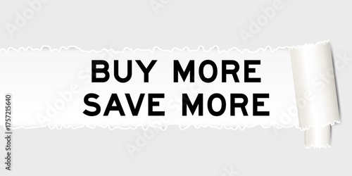 Ripped gray paper background that have word buy more save more under torn part