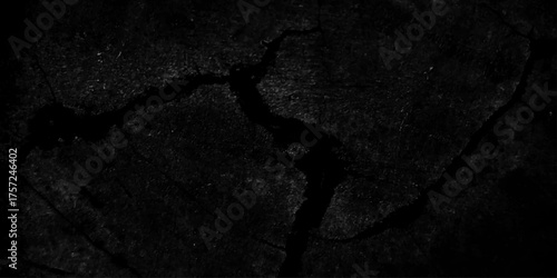 Dark black background backdrop studio, cement concrete dust surface rough crack wall texture. black old paper texture. stone marble texture. black dirty concrete wall backdrop. 